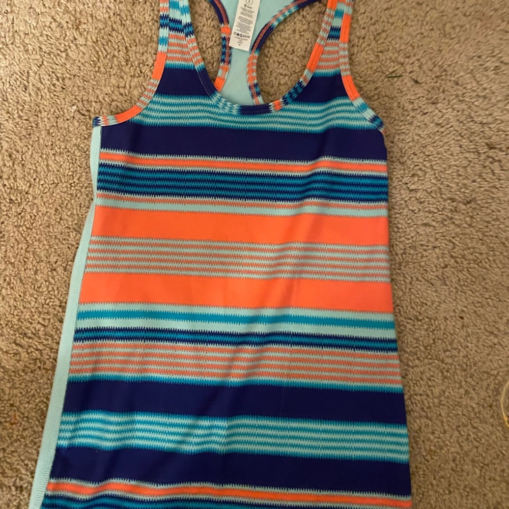 3 ivviva size 8 tank tops. No stains or flaws never been worn.